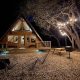 a-frame cabins in texas with fairy lights at night