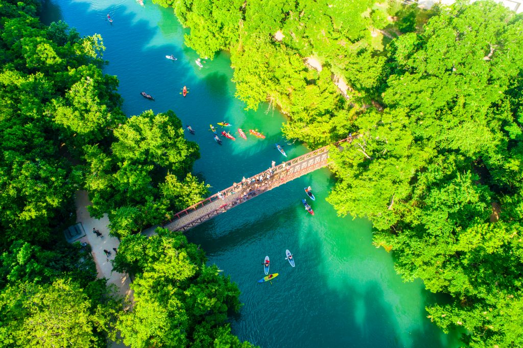people kayaking on a river during their weekend in austin itinerary