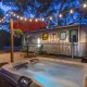 airstream camper with lights and hot tub for glamping in texas