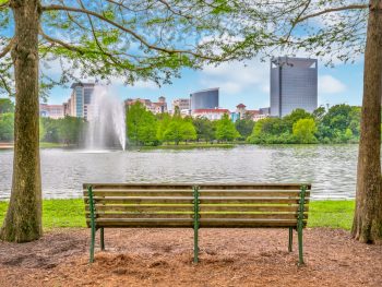 park bench overlooking McGovern lake one of the best lakes in houston