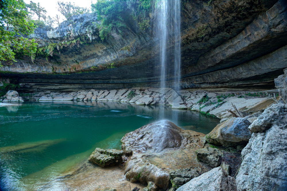 water pool surrounded by rocks