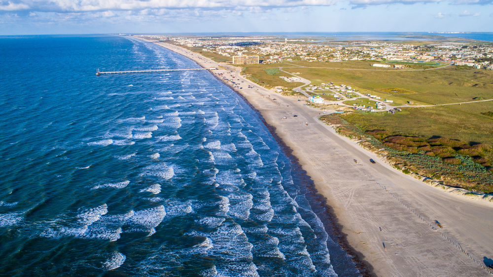 aerial view of beach and blue ocean water beaches in corpus christi