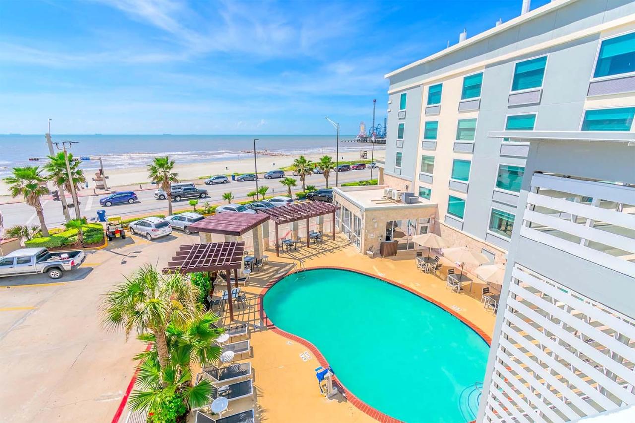 pretty view of a pool at one of the galveston hotels on the beach in texas