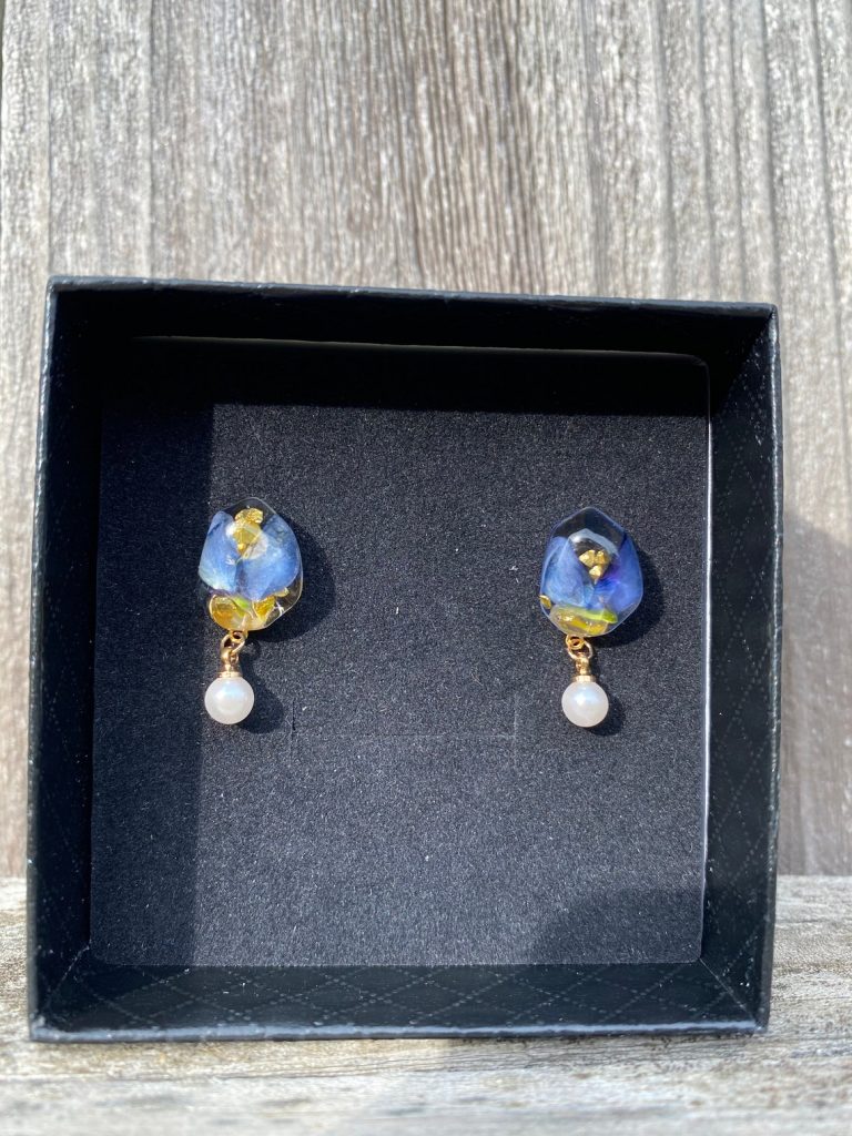 earrings in blue color