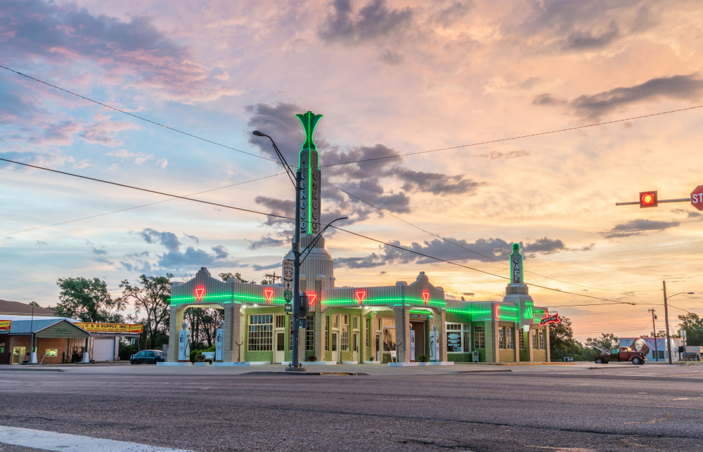 city with lit up buildings route 66 in texas