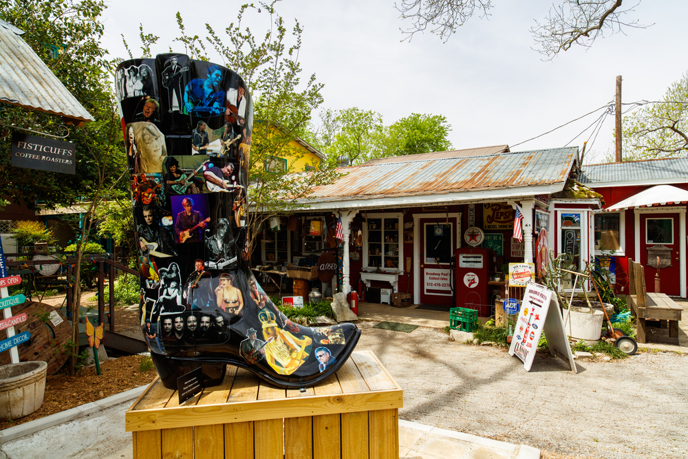 : Colorful shop with artwork and vintage items on display in the small Texas Hill Country town of Wimberley.