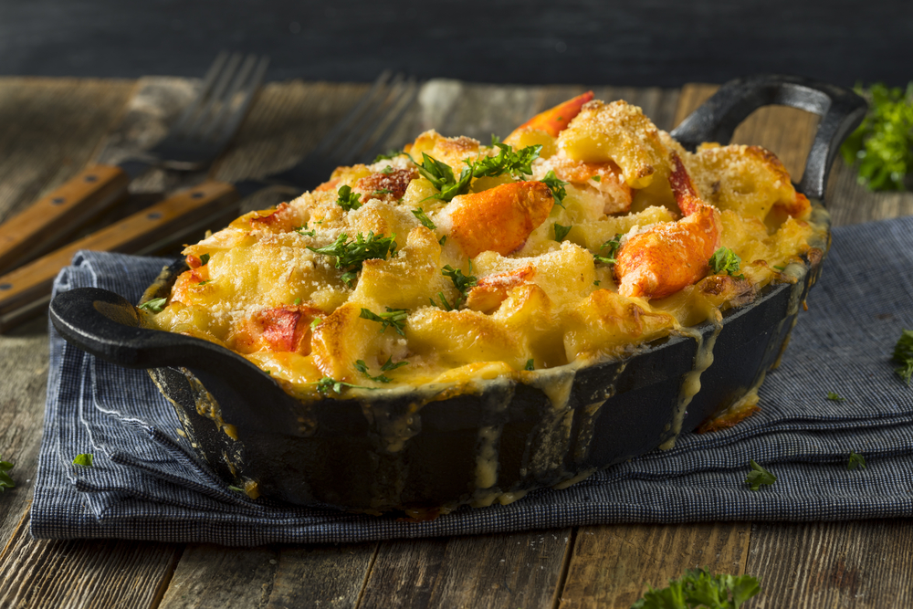 Lobster macaroni and cheese in a black bowl