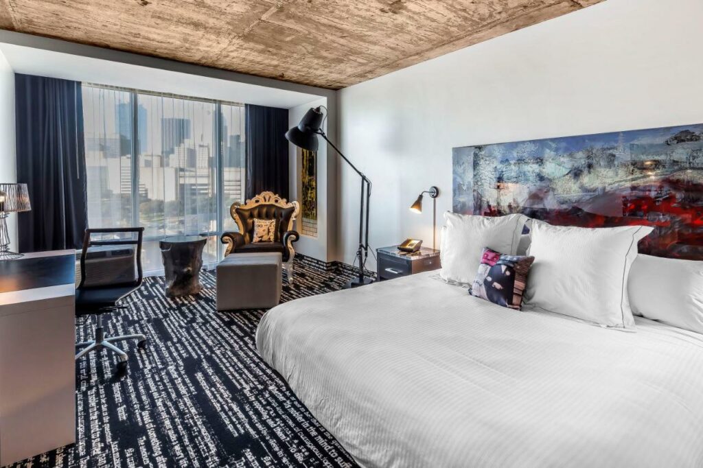 black and white room with carpeting and big bed best boutique hotels in dallas