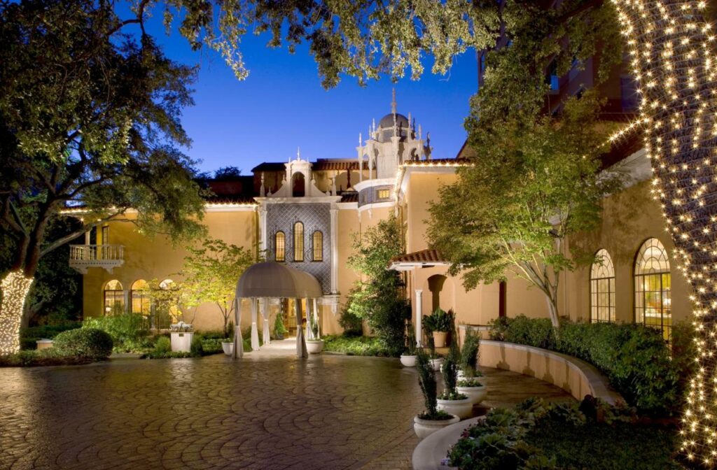courtyard of a building surrounded by trees best boutique hotels in dallas