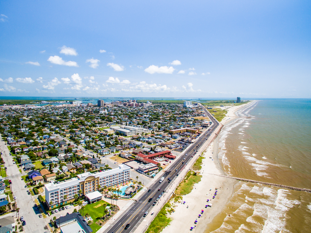 Aerial view of a beach and the town weekend getaway from Houston