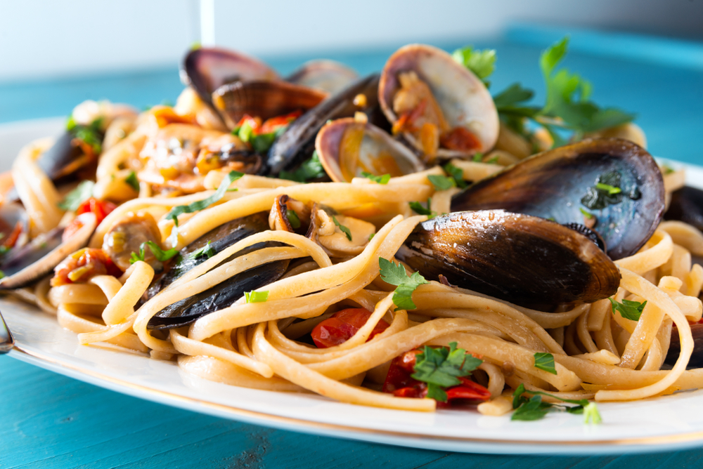 A plate of seafood pasta best things to do in Austin at night