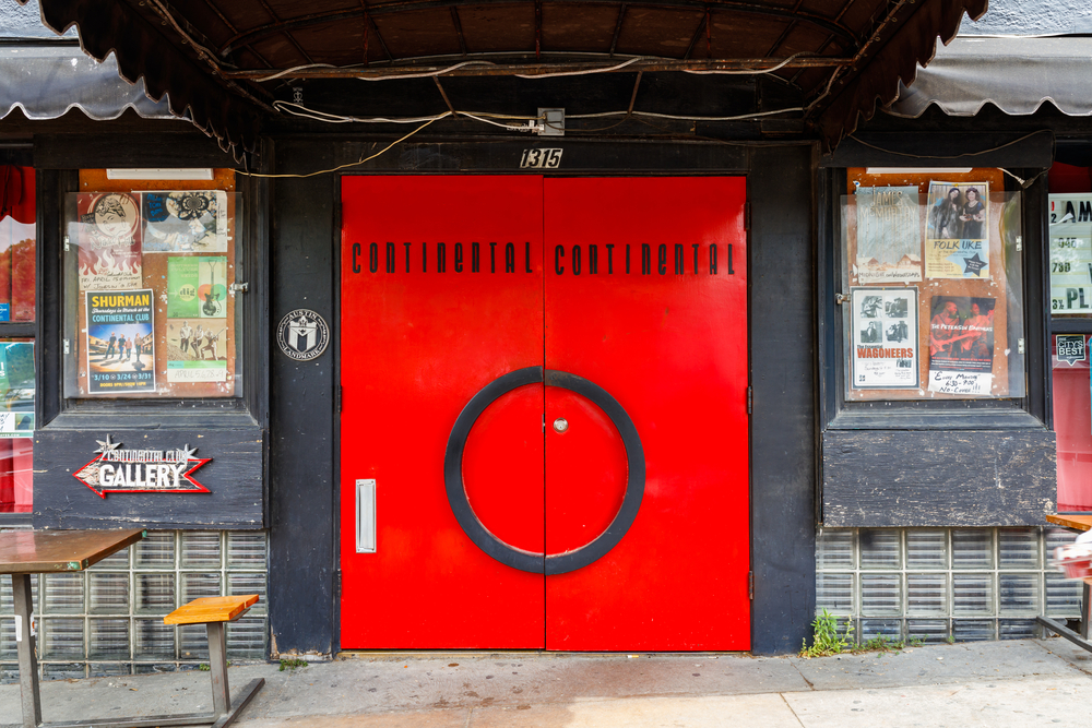 Red colored door to a building
