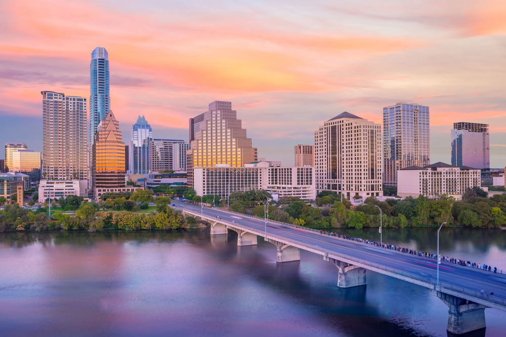 Sunset over the skyline of Austin and the river.