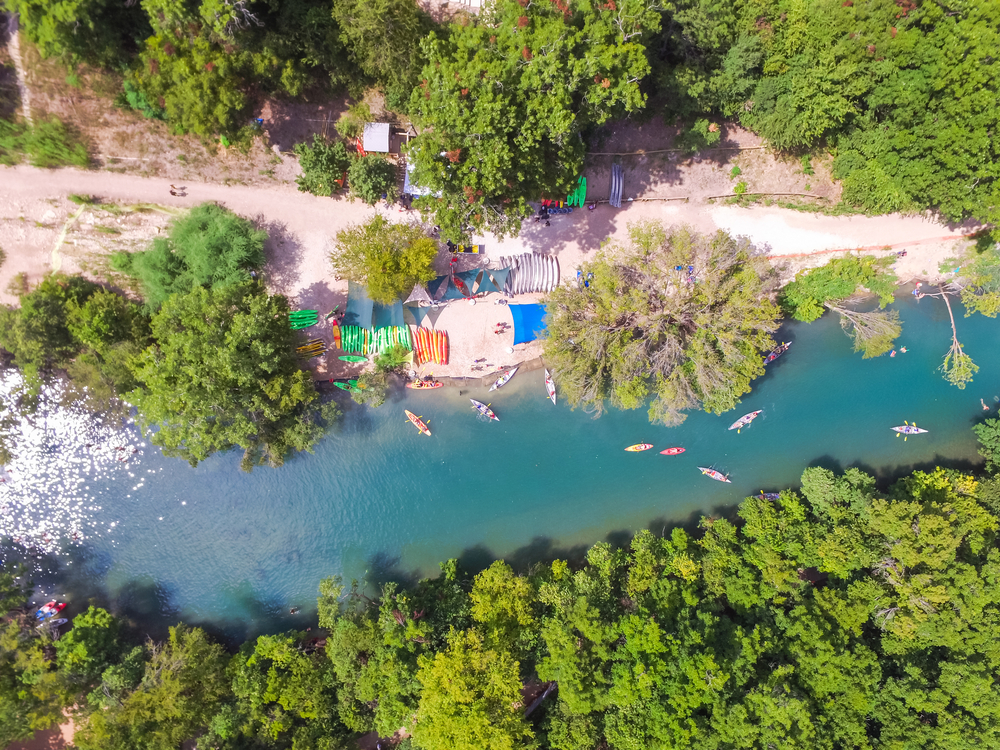 Aerial view of kayaks paddling in Barton Springs, one of the prettiest springs in Texas.