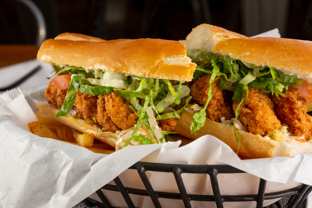 A basket holding a po boy sandwich at one of the best restaurants in San Antonio