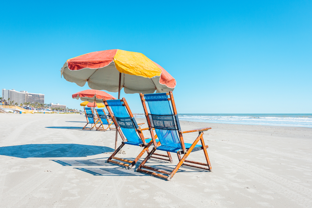 chair and umbrella on one of the best beaches near houston