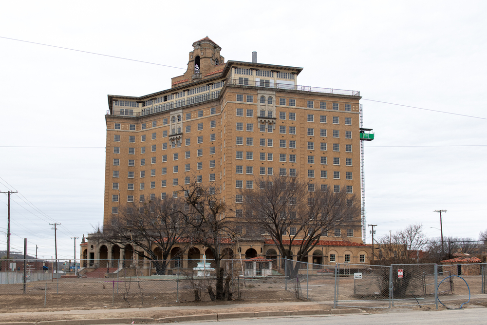 The baker hotel an old abandoned building on a cloudy day one of the most haunted places in texas