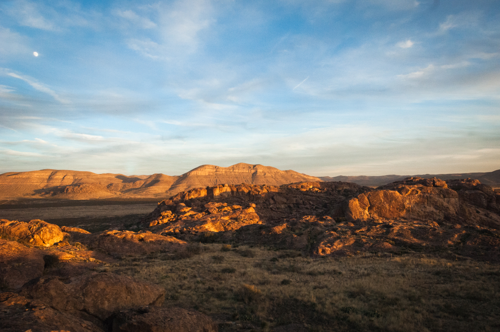 The Sun Setting Across The Mountains At Hueco Tanks