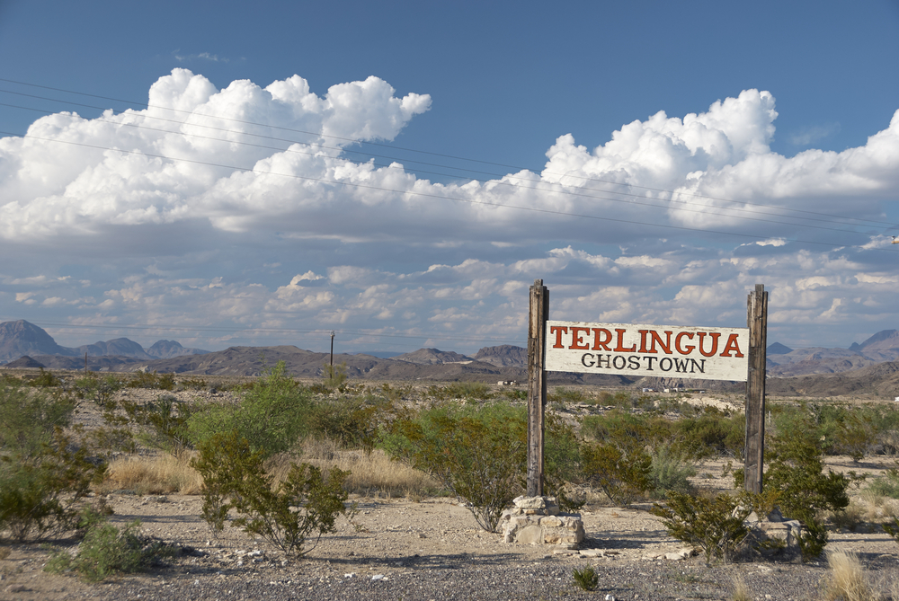 photo of a city sign for Terlingua, Texas that says Ghost Town  