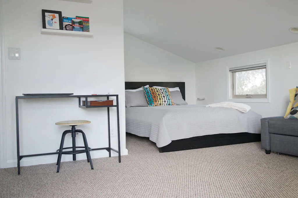 The clean and minimalist SoCo Apartment is a perfect place to stay during your weekend in Austin.