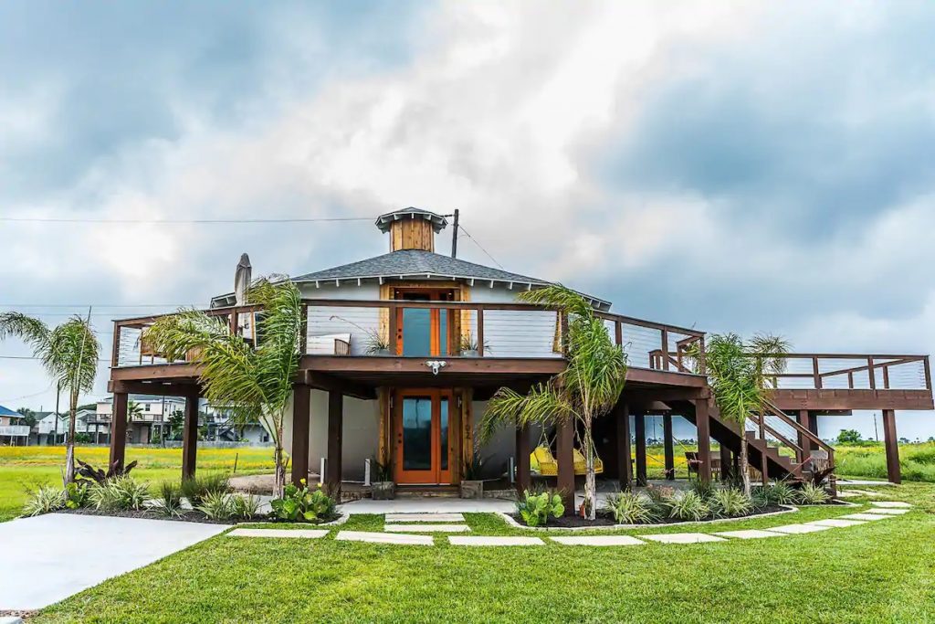 Photo of the exterior of The Kettle House, which is an Airbnb in Galveston. This is one of the best vacation rentals in Texas. 