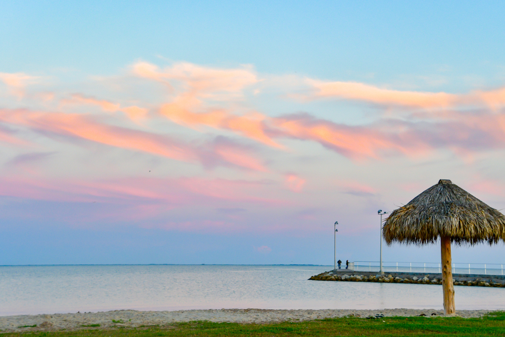 a view of a small beach in Texas at sunset