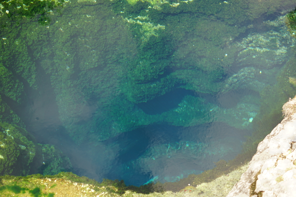 Jacob's Well is deep-- this picture tries to show the 141 feet in which it expands to! 