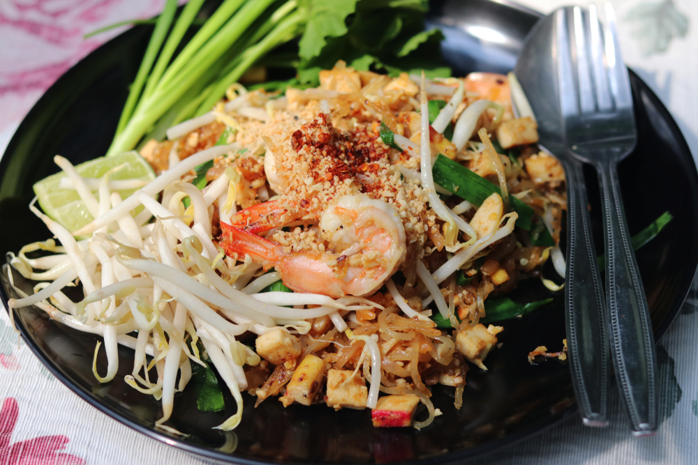 Thai pad thai served on a dish with shrimp