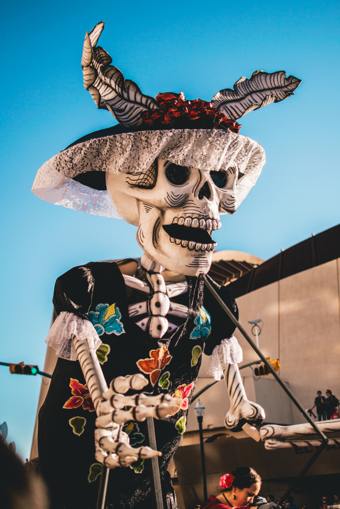 A skeleton marionettes in the Day of the Dead parade in El Paso.