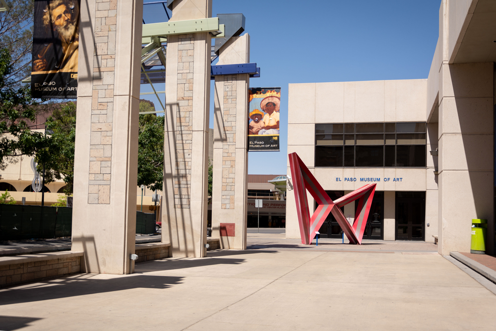 The entrance to the El Paso Museum of Art with a sculpture outside.