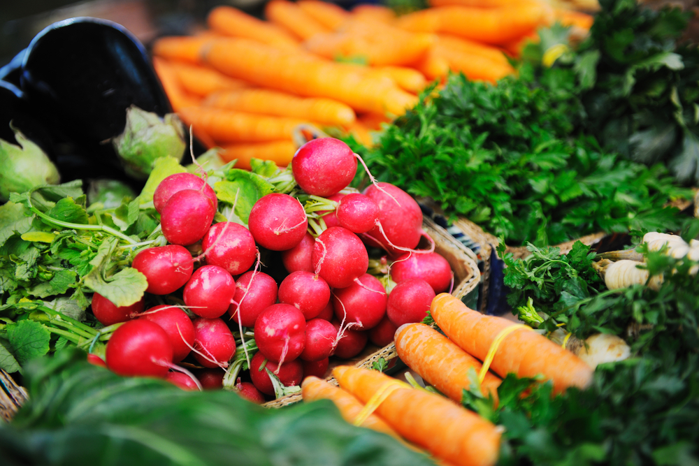 Radishes, carrots, and other veggies at the El Paso Farmers' Market.