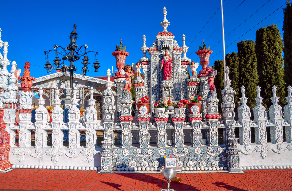 The brightly colored Sugar House carvings.