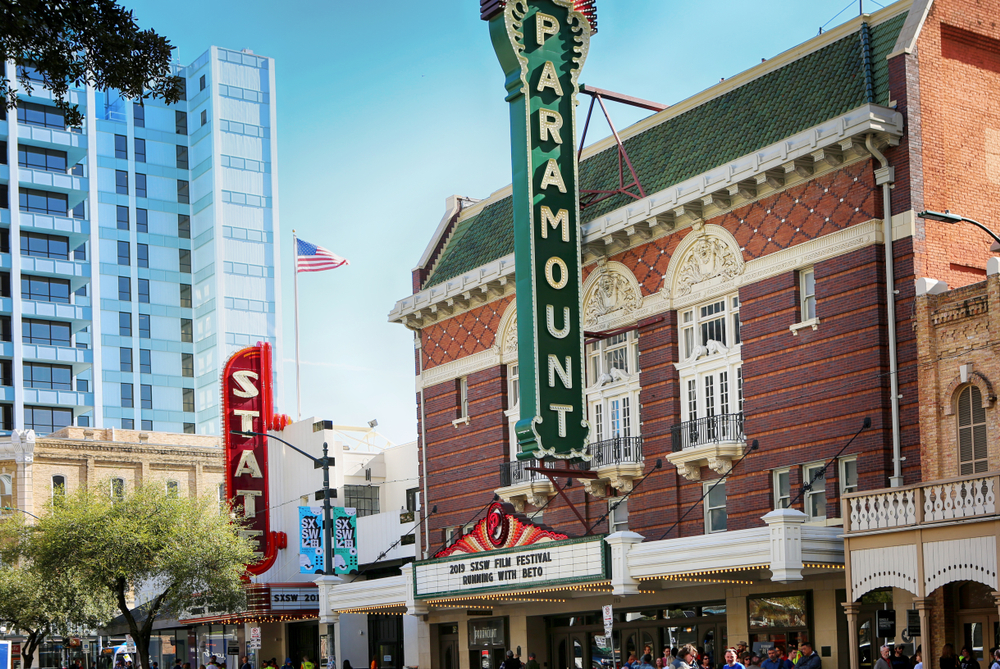 Front of theater building on South Congress Street with vertical sign reading Paramount, one of the best things to do in Austin. 