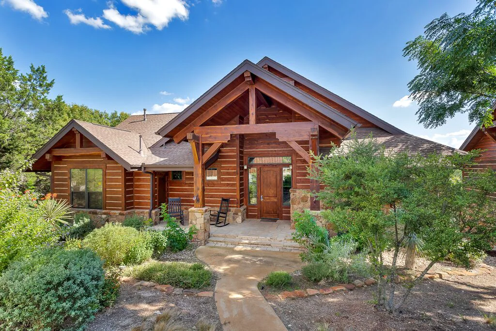 rustic cottage with hill country view