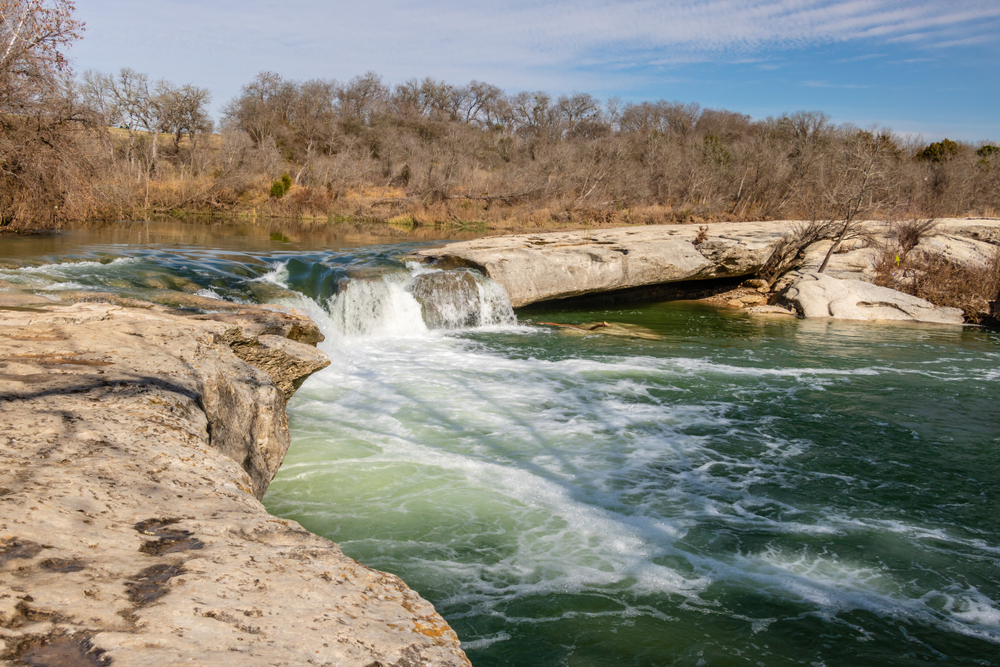 photo of upper mckinney falls. one of the best waterfalls near austin.