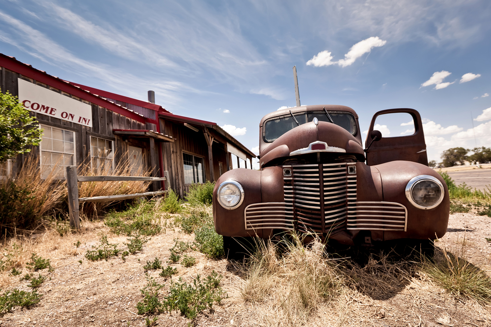 Abandoned vehicle on road