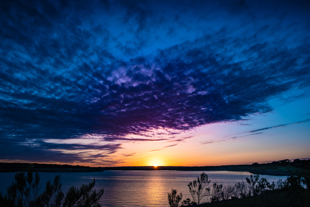 Photo of nightfall at Lake Georgetown, one of the best lakes near Austin for camping!