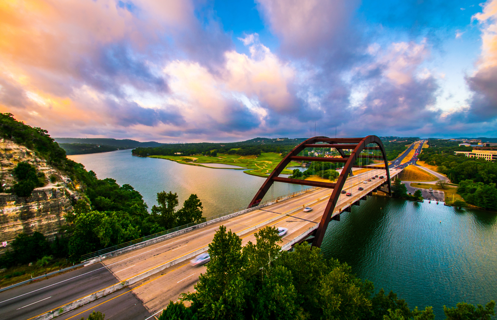 Photo of the 360 Bridge on Lake Austin at sunset. Lake Austin is one of the best lakes in Austin. 