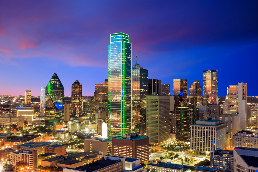 Photo of Dallas skyline at night. 