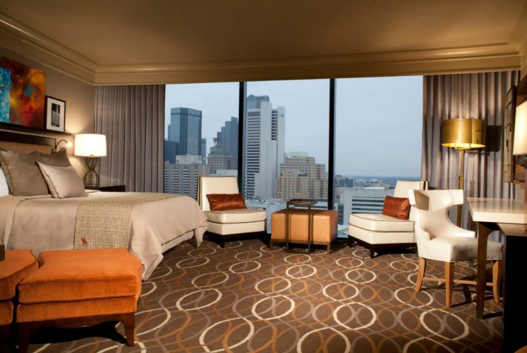 Photo of a beautiful room at Omni Dallas Hotel with an amazing view of Dallas. 
