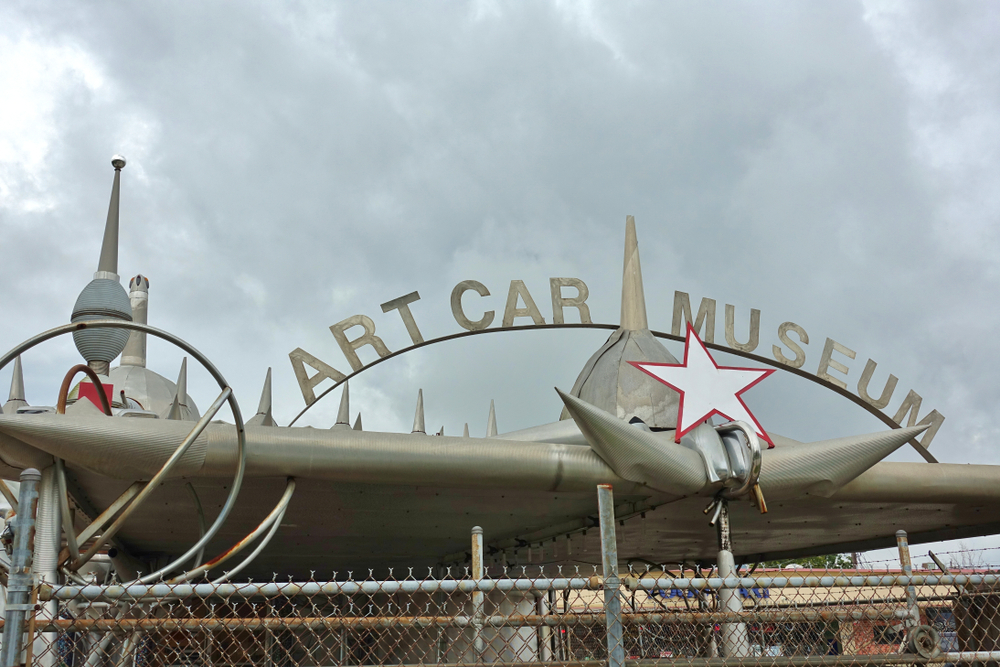 The front sign of the ArtCar Museum on a cloudy weekend in Houston