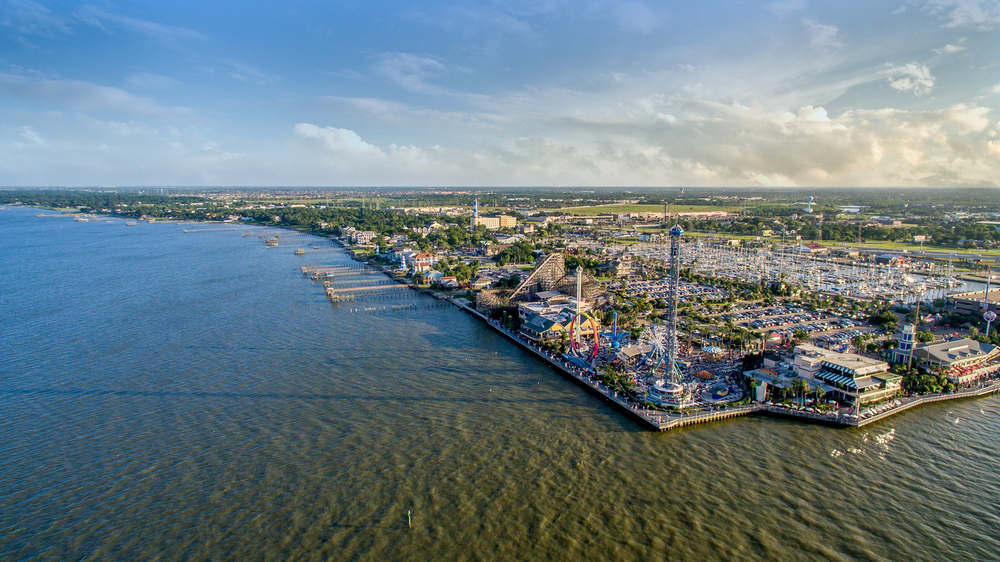 An aerial view of Galveston Texas and the Kemah Boardwalk on a sunny day