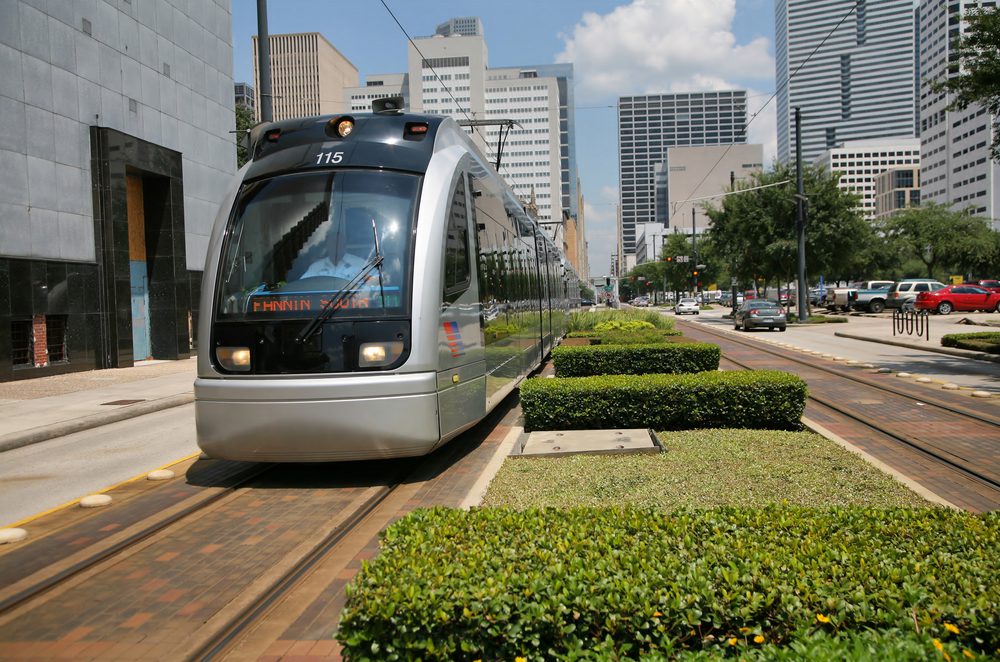 A metro train in Houston on a bright sunny day