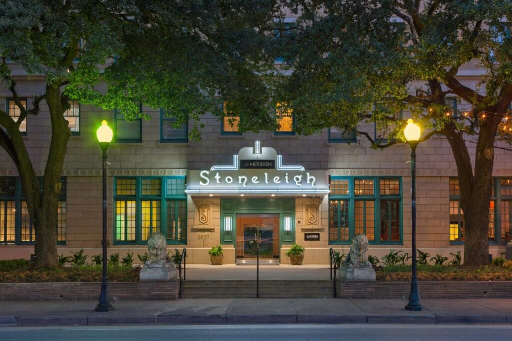 The front of the Stoneleigh hotel catches the eye and screams "where to stay in Dallas" with its boutique styled windows, green-lined decor and street lined trees. 
