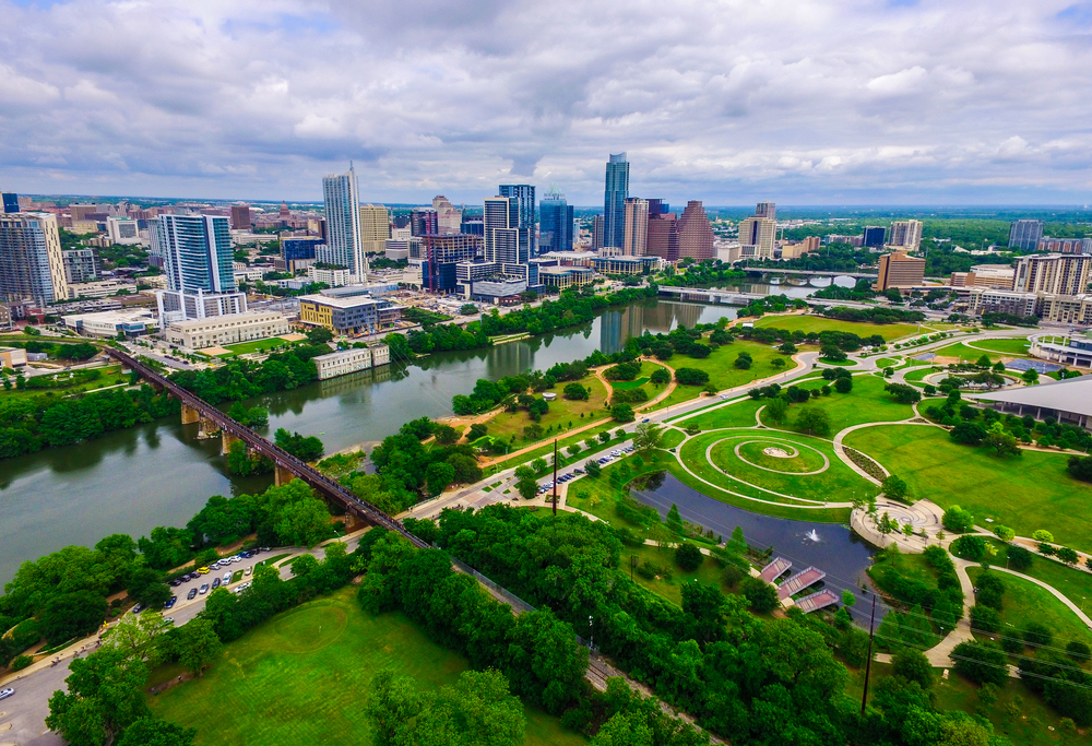 Zilker is where to stay in Austin for those who love the outdoors and green: this over head image shows the huge green parks by the neighborhood. 