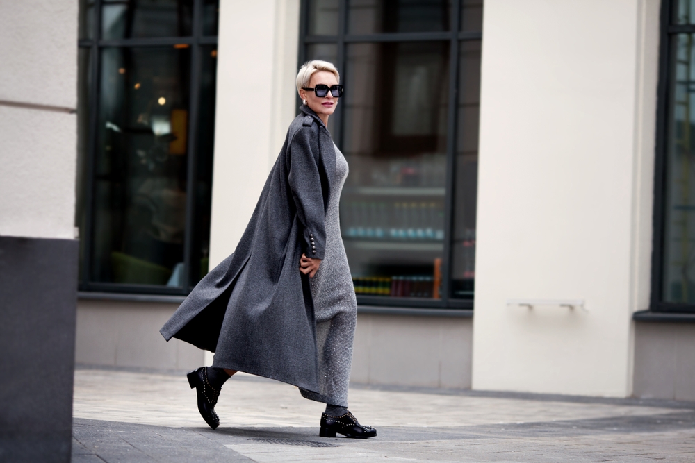 women in sweater dress and long coat. One of the   Dallas outfit ideas